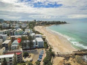 an aerial view of a beach and the ocean at Beachcomber Unit 4 7 Dingle Ave in Caloundra