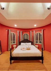 Ein Bett oder Betten in einem Zimmer der Unterkunft Renjana Beach House