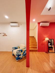 Ein Bett oder Betten in einem Zimmer der Unterkunft Renjana Beach House