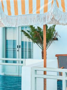 Ein Balkon oder eine Terrasse in der Unterkunft Renjana Beach House