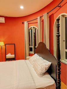 Ein Bett oder Betten in einem Zimmer der Unterkunft Renjana Beach House