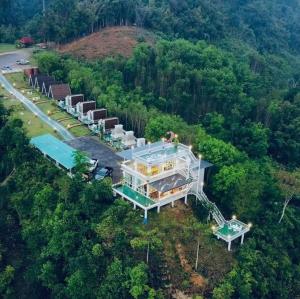 an overhead view of a house in the middle of a forest at Khao Sok 99 Camp and Cafe in Khao Sok National Park