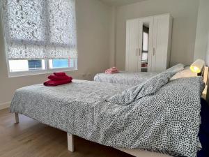 Posteľ alebo postele v izbe v ubytovaní Apartamento Aguanaz 1