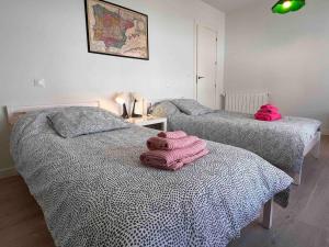 Posteľ alebo postele v izbe v ubytovaní Apartamento Aguanaz 1