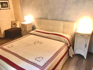 Postel nebo postele na pokoji v ubytování Dimora del Riccio