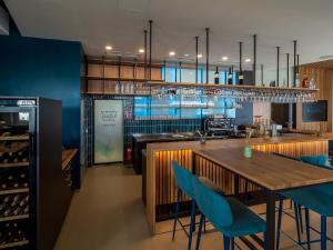 Küche/Küchenzeile in der Unterkunft freilich. Bistro. Bar. Hotel - digitaler self check in