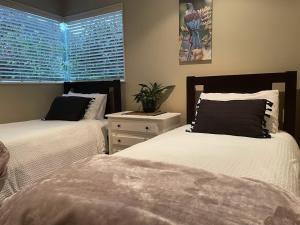 Ένα ή περισσότερα κρεβάτια σε δωμάτιο στο Maddisons Garden Guest Suite - Coatesville
