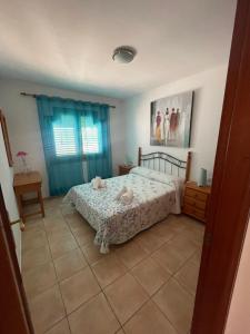 Postel nebo postele na pokoji v ubytování Apartamento Gaudia + 21 fotografií