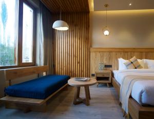 En eller flere senge i et værelse på Hotel Rewa Ladakh