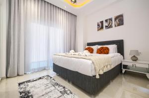 Postel nebo postele na pokoji v ubytování Yekta Blue 3 Residence by NewInn