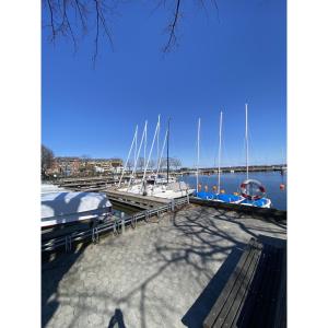 a group of boats docked at a dock at ApartmentInCopenhagen Apartment 1533 in Hellerup