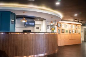 a restaurant with a bar in a room at Knowsley Inn & Lounge in Knowsley