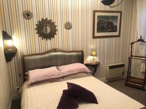 L'enclos Des Lys, Villa Raffinée Proche de la Mer, Linge Inclus客房内的一张或多张床位