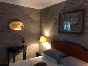 L'enclos Des Lys, Villa Raffinée Proche de la Mer, Linge Inclus客房内的一张或多张床位