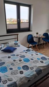 Postel nebo postele na pokoji v ubytování Sunset Beach