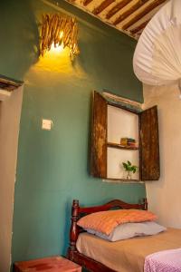 Katil atau katil-katil dalam bilik di Firefly Boutique Lodge