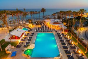 an aerial view of a resort with a swimming pool at Pavlo Napa Beach Hotel in Ayia Napa