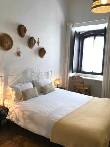Кровать или кровати в номере Casa Largo do Poço Guesthouse +37 фотографий