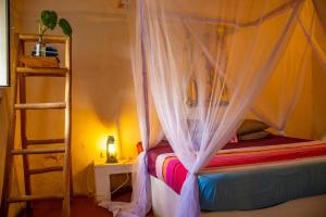 Katil atau katil-katil dalam bilik di Firefly Boutique Lodge
