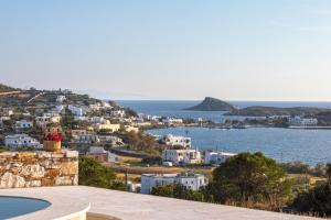 a view of a city and the ocean at Syros Grace eco-Villa with Jacuzzi & Stuning Views in Ano Syros