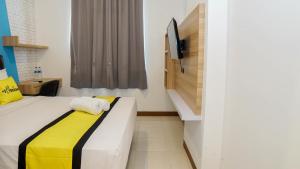 Letto o letti in una camera di My Rooms at Paskal Hyper Square