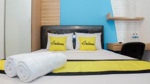 Letto o letti in una camera di My Rooms at Paskal Hyper Square