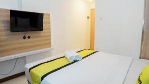 Letto o letti in una camera di My Rooms at Paskal Hyper Square
