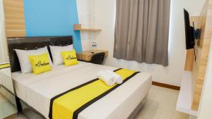 Letto o letti in una camera di My Rooms at Paskal Hyper Square