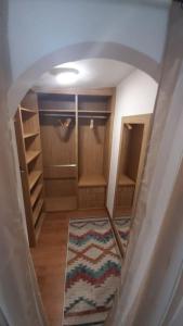 an overhead view of a walk in closet with shelves at Piso céntrico con encanto in Santander