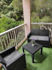 Μπαλκόνι ή βεράντα στο Charmant studio climatisé 24 m2 terrasse à 100m de la plage