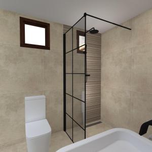 a bathroom with a toilet and a bath tub at Palma Seaside Villa 3 in Sarti