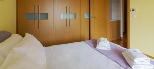 Ένα ή περισσότερα κρεβάτια σε δωμάτιο στο Villa Erondas