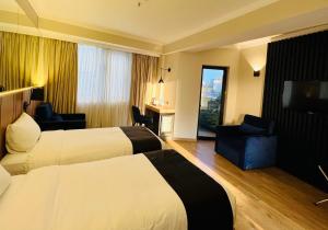 Katil atau katil-katil dalam bilik di Genesis Kosher Hotel Tbilisi