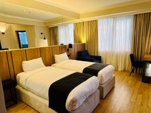 Katil atau katil-katil dalam bilik di Genesis Kosher Hotel Tbilisi