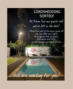 a sign that says we are waiting for you with a windmill at Karoo Sun Boutique Guest House in Oudtshoorn