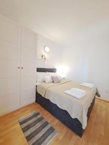 Posteľ alebo postele v izbe v ubytovaní Villa Porto