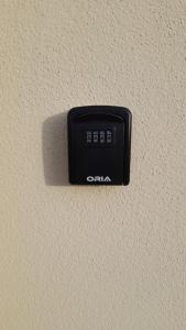 a black outlet on a white wall at Casina al mare in Cecina