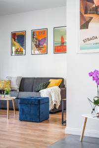 A seating area at Outdooredo Garda Apartment
