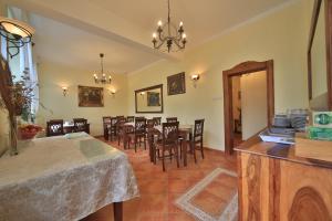 a dining room with a table and chairs at Villa Alexandra in Świnoujście