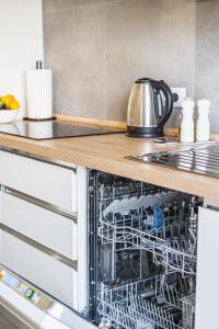 A kitchen or kitchenette at Outdooredo Garda Apartment