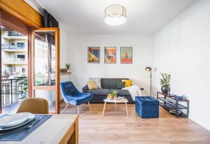 A seating area at Outdooredo Garda Apartment