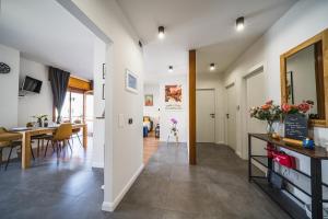 A kitchen or kitchenette at Outdooredo Garda Apartment
