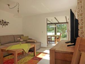 Et tv og/eller underholdning på Ferienwohnungen am Waldessaum