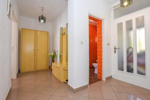a bathroom with a sink and a toilet in a room at APARTMANI MARIJA LJUBICA in Pag +73 photos