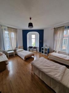 Postel nebo postele na pokoji v ubytování Kaktus Guest House