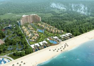 an aerial view of the resort and the beach at IXORA Ho Tram By Fusion in Ho Tram
