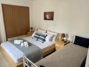 Voodi või voodid majutusasutuse Aretousa Residence in Naoussa, Paros toas