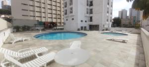 The swimming pool at or close to Apartamento Liberdade
