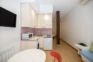 Kuchnia lub aneks kuchenny w obiekcie Oriente Suites