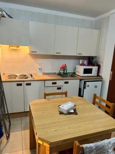 Kuchyň nebo kuchyňský kout v ubytování Appartement proche plage